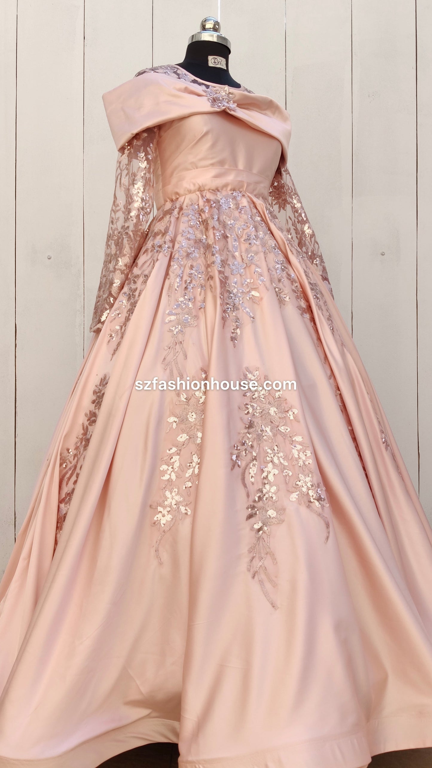 Pink evening gown with floral embroidery