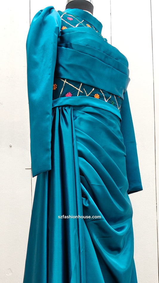 Teal evening gown with floral embellishments