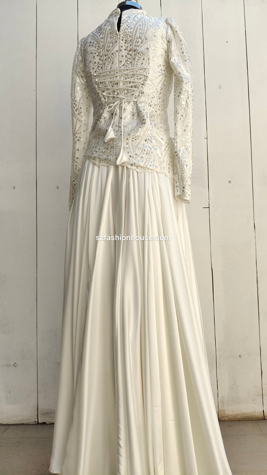 White lace top and flowing white skirt