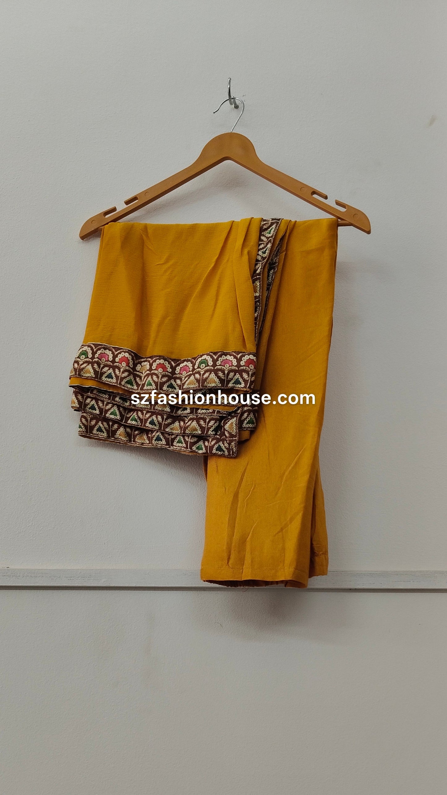Yellow dupatta with a patterned border and yellow pant