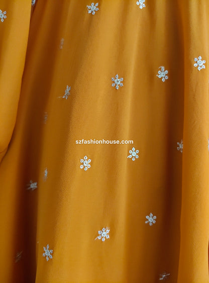 Fabric with small white floral patterns, featuring 'szfashionhouse.com' branding.