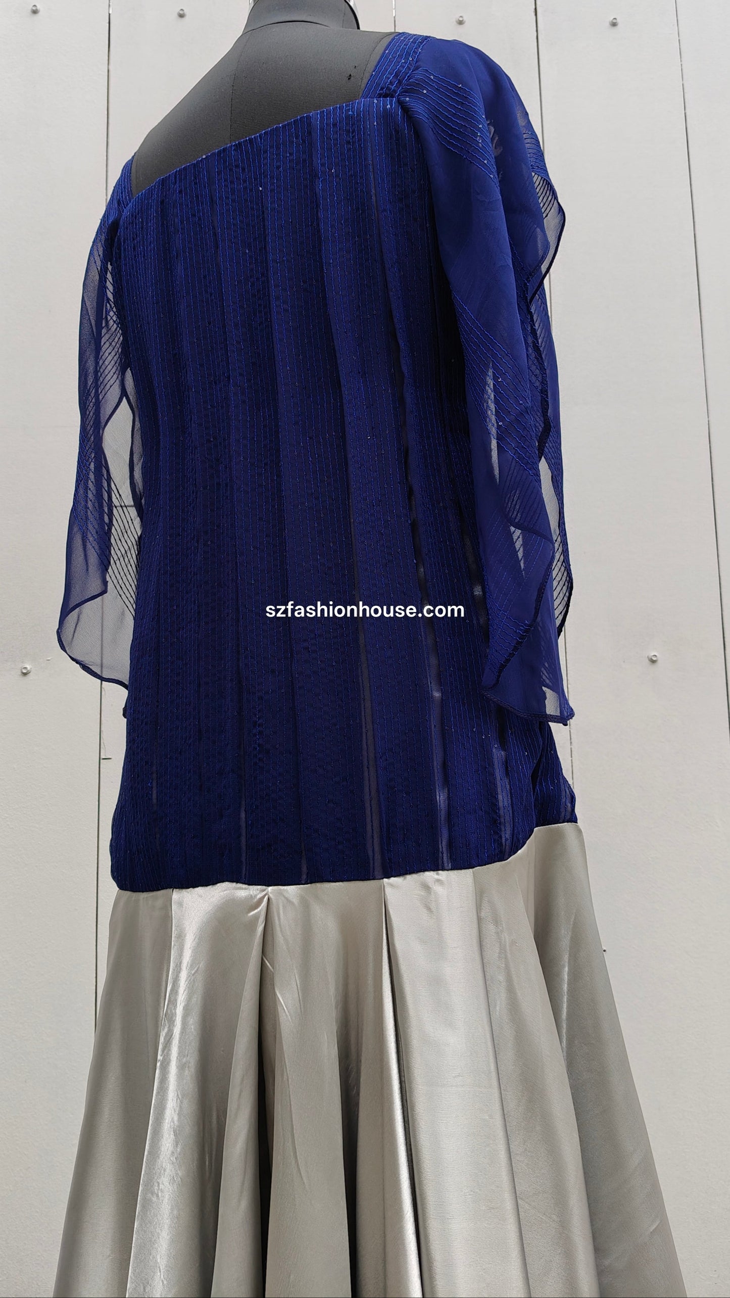 Blue top and gray skirt 