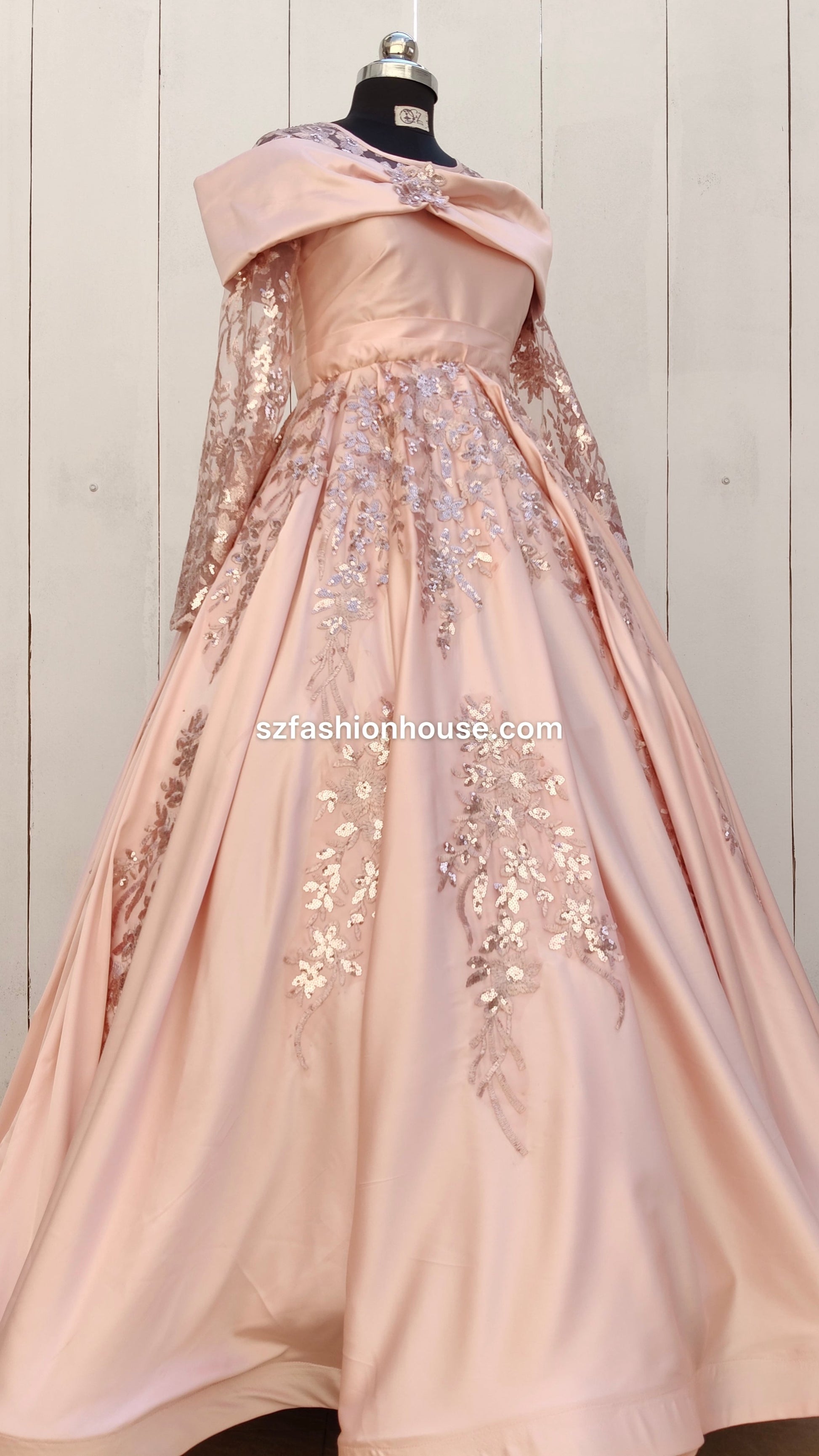 Pink evening gown with floral embroidery