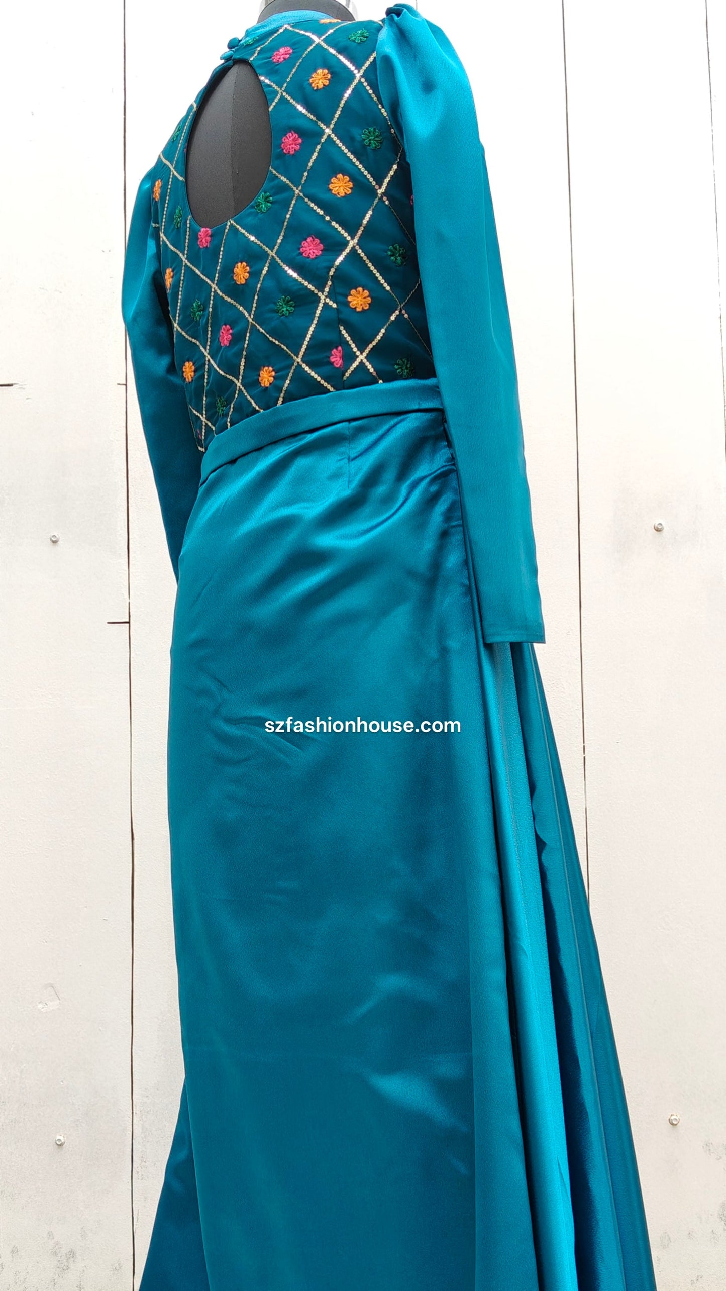 Teal saree with embroidered blouse 