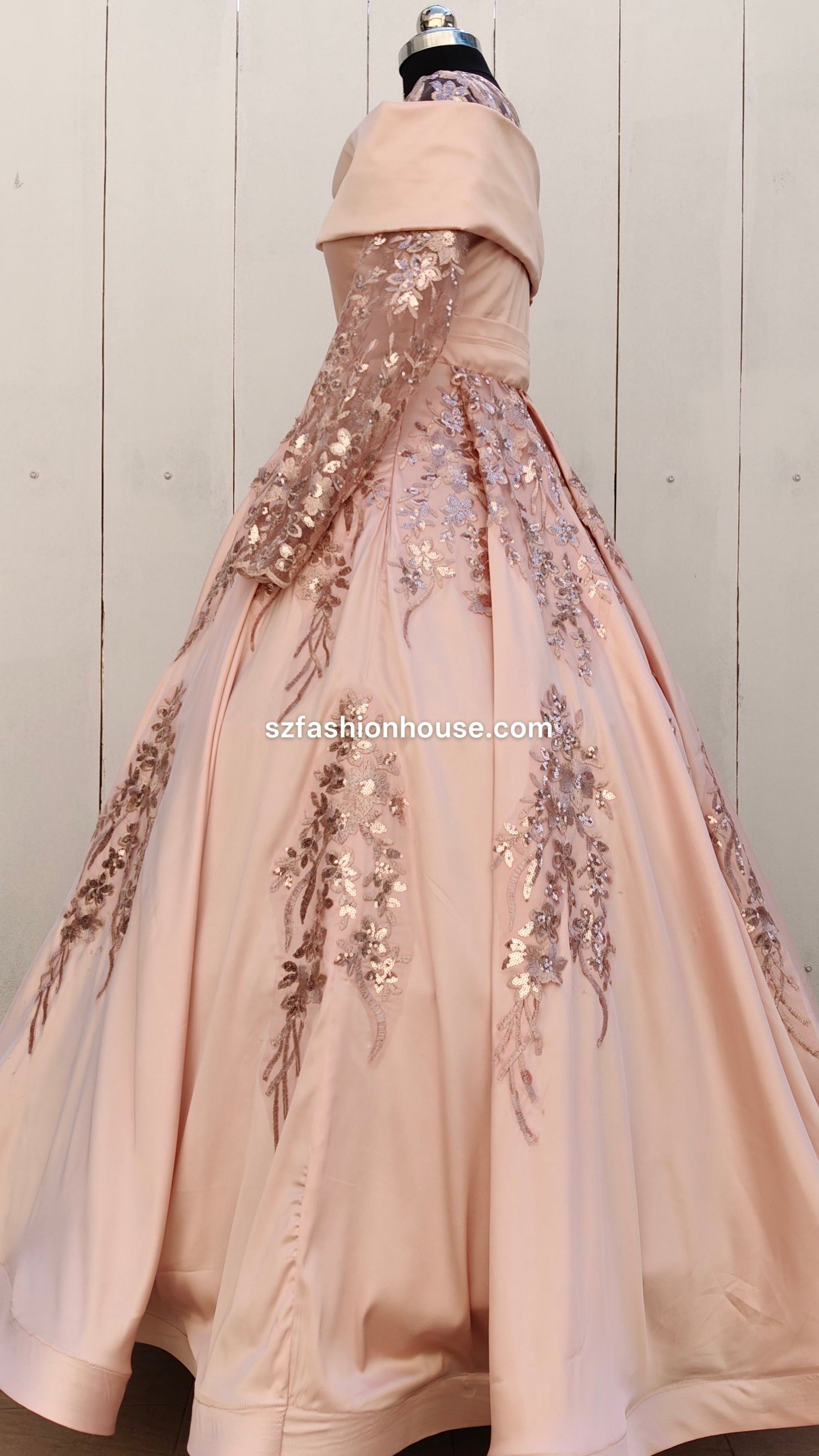 Beige evening gown with floral embroidery