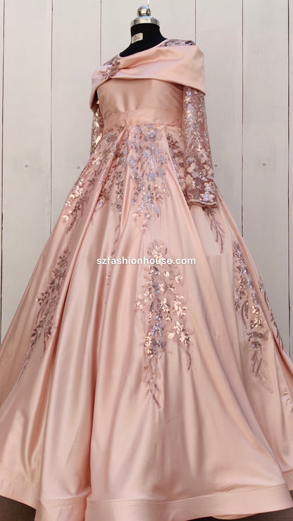 Pink evening gown with floral embroidery