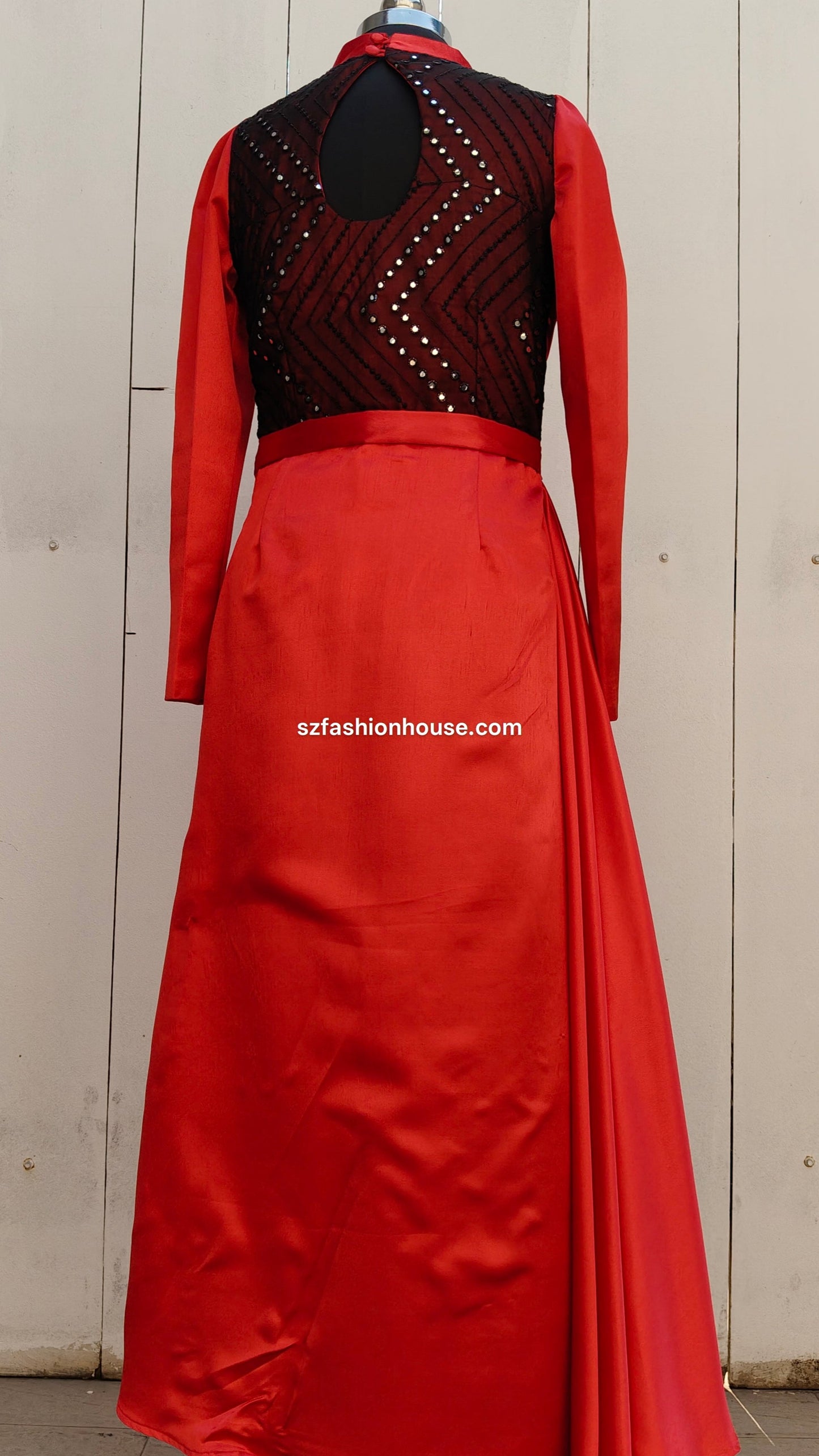 Red evening gown with black embellished top 