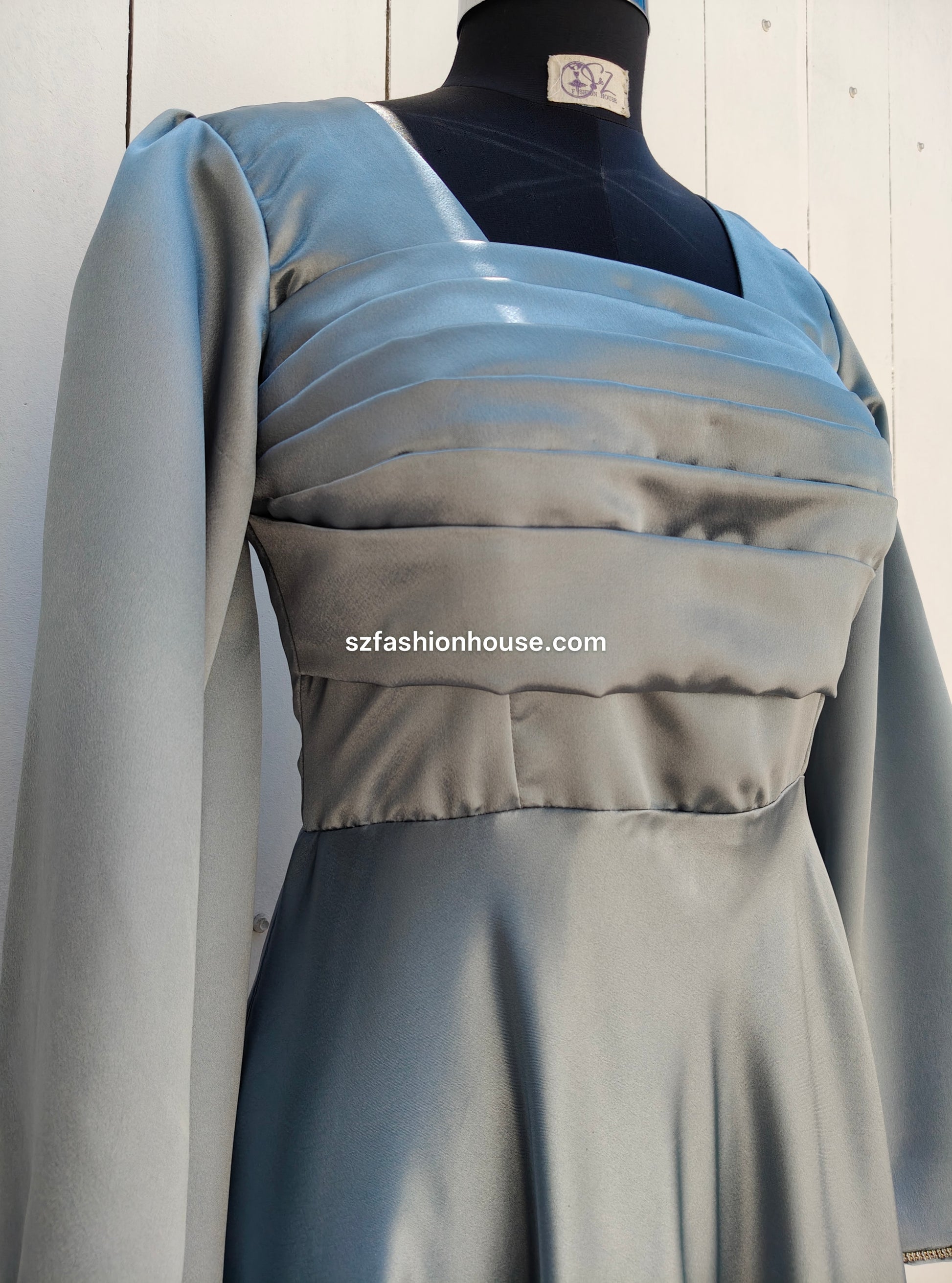 light silver designer gown, satin party wear gown, elegant silver gown for women, long sleeve designer dress, reception gown for women, wedding guest gown, luxury satin gown India, flared evening gown, modest designer gown, premium party wear dress, S&Z Fashion House gown, stylish silver maxi gown, engagement wear gown, women’s designer gown online India,
online shopping, muslim, islam, christian, full cover