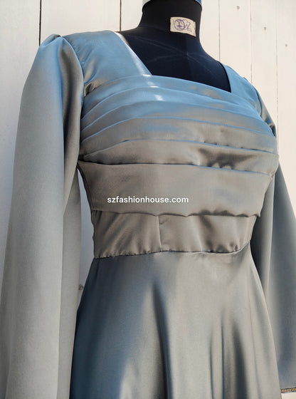 light silver designer gown, satin party wear gown, elegant silver gown for women, long sleeve designer dress, reception gown for women, wedding guest gown, luxury satin gown India, flared evening gown, modest designer gown, premium party wear dress, S&Z Fashion House gown, stylish silver maxi gown, engagement wear gown, women’s designer gown online India,
online shopping, muslim, islam, christian, full cover