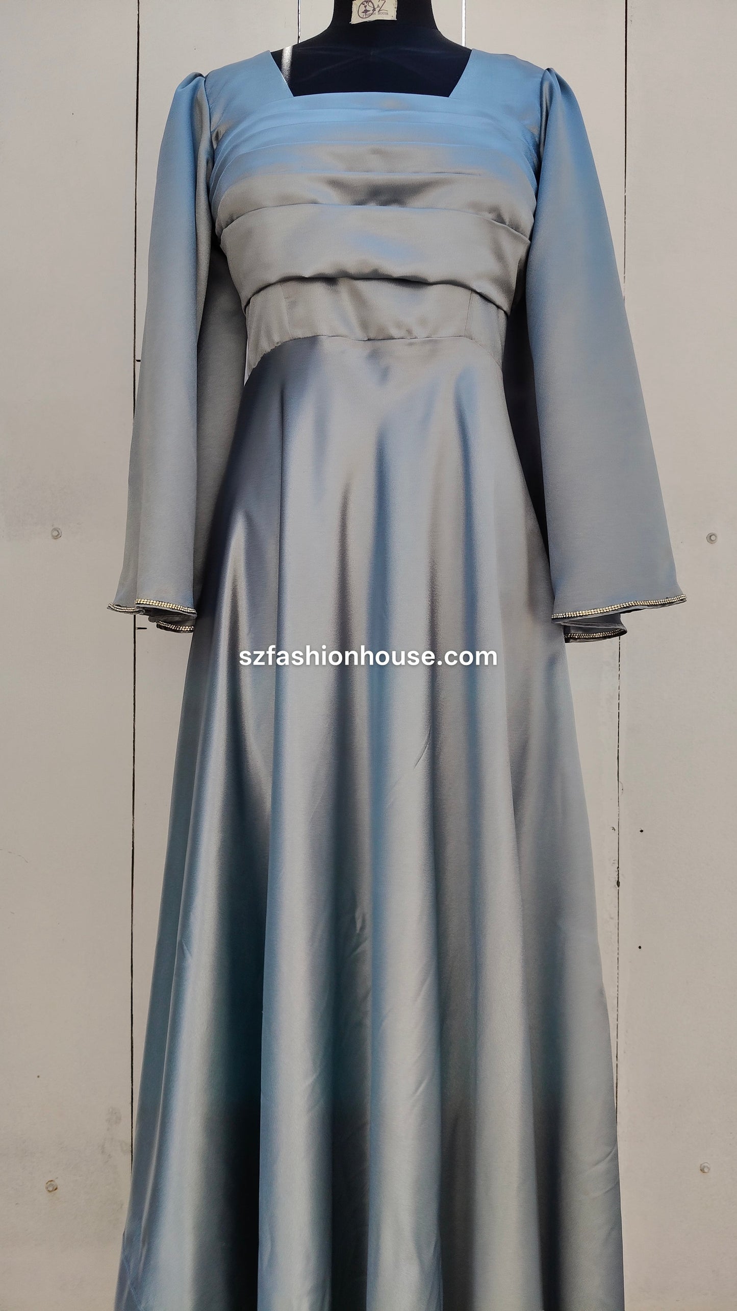 light silver designer gown, satin party wear gown, elegant silver gown for women, long sleeve designer dress, reception gown for women, wedding guest gown, luxury satin gown India, flared evening gown, modest designer gown, premium party wear dress, S&Z Fashion House gown, stylish silver maxi gown, engagement wear gown, women’s designer gown online India,
online shopping, muslim, islam, christian, full cover