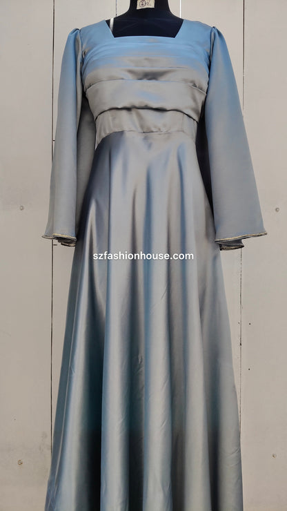 light silver designer gown, satin party wear gown, elegant silver gown for women, long sleeve designer dress, reception gown for women, wedding guest gown, luxury satin gown India, flared evening gown, modest designer gown, premium party wear dress, S&Z Fashion House gown, stylish silver maxi gown, engagement wear gown, women’s designer gown online India,
online shopping, muslim, islam, christian, full cover