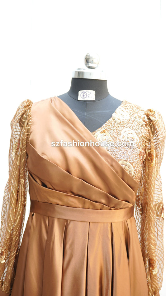 brown designer gown, satin evening gown for women, luxury party wear gown, embellished sleeve gown, elegant brown maxi dress, wedding guest gown India, reception wear gown, satin flare gown, designer long gown for women, premium evening dress, modest party wear gown, S&Z Fashion House gown, engagement party dress, stylish satin gown online India, modest gown