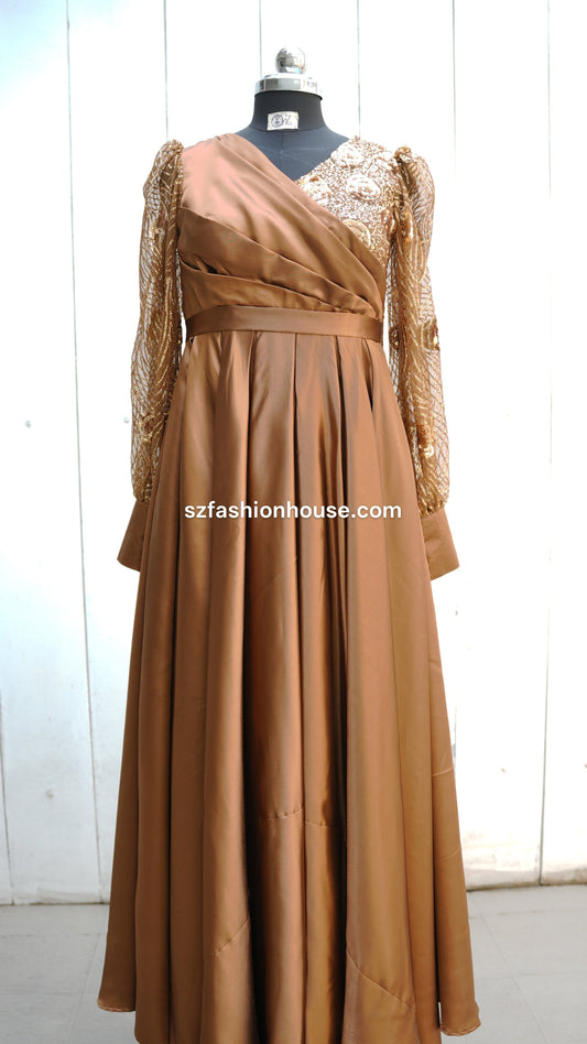 brown designer gown, satin evening gown for women, luxury party wear gown, embellished sleeve gown, elegant brown maxi dress, wedding guest gown India, reception wear gown, satin flare gown, designer long gown for women, premium evening dress, modest party wear gown, S&Z Fashion House gown, engagement party dress, stylish satin gown online India, modest gown
