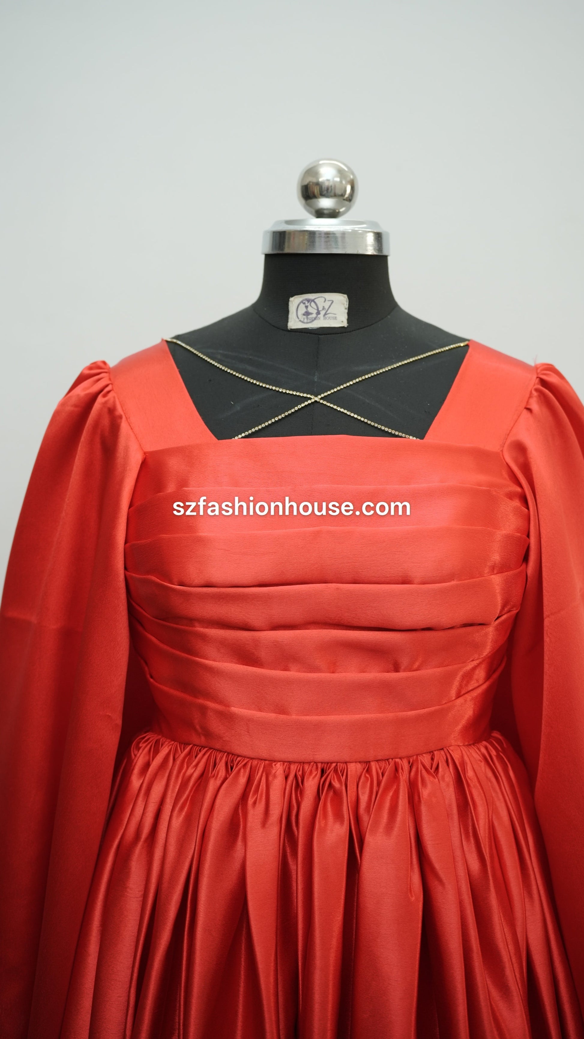 red designer gown, red satin gown, party wear gown for women, elegant red evening gown, luxury satin dress, designer gown online India, reception wear gown, engagement party dress, wedding guest gown, modest designer gown, flared satin gown, long sleeve party wear dress, premium red gown, formal evening dress, S&Z Fashion House designer gown, women's luxury gown India, modest wear, modest fashion, modest