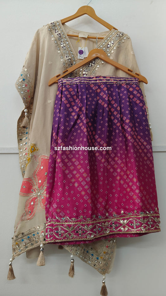 Traditional outfit with embroidered top and sharara patterned pant