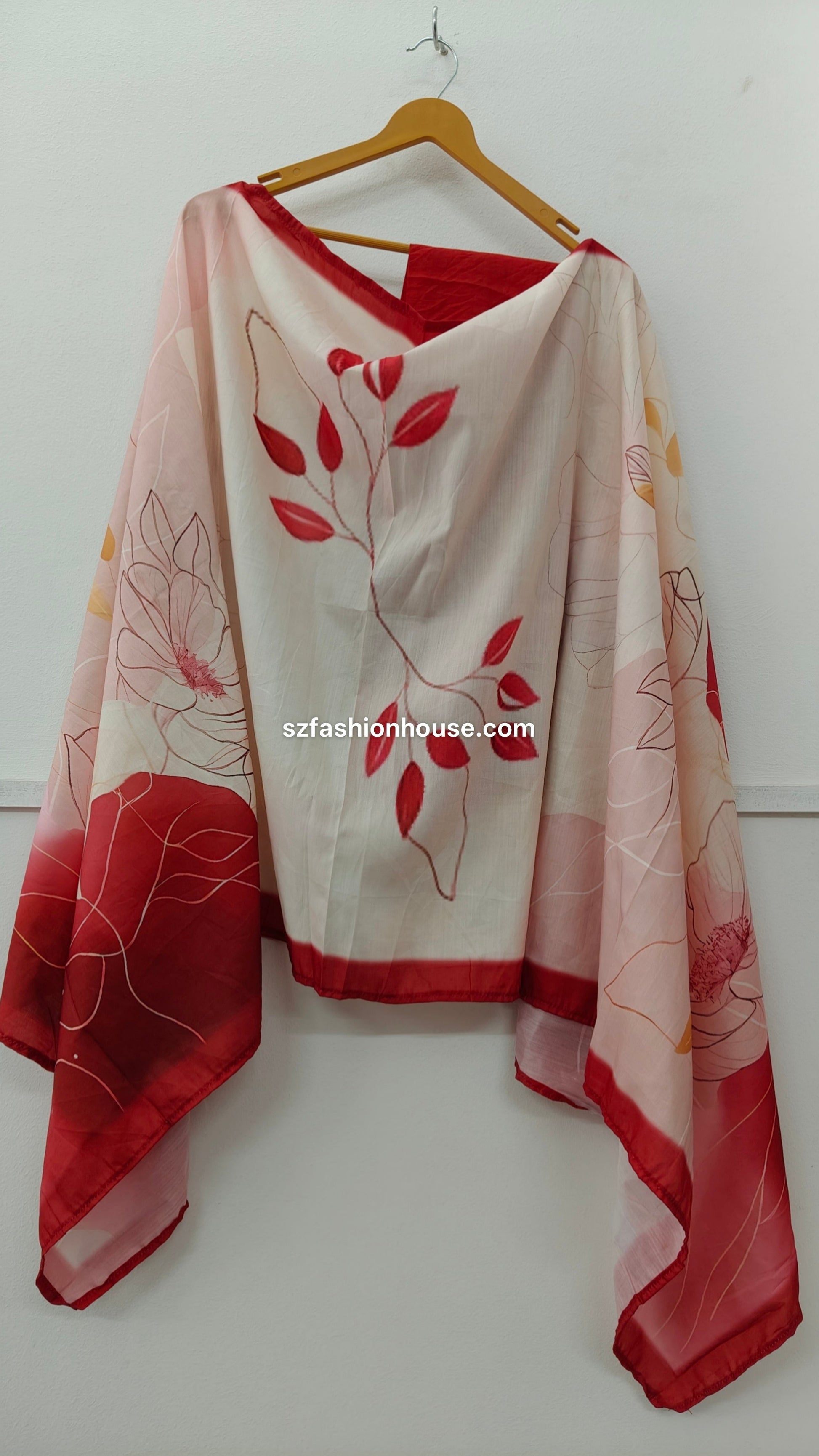 Red and beige scarf with floral patterns
