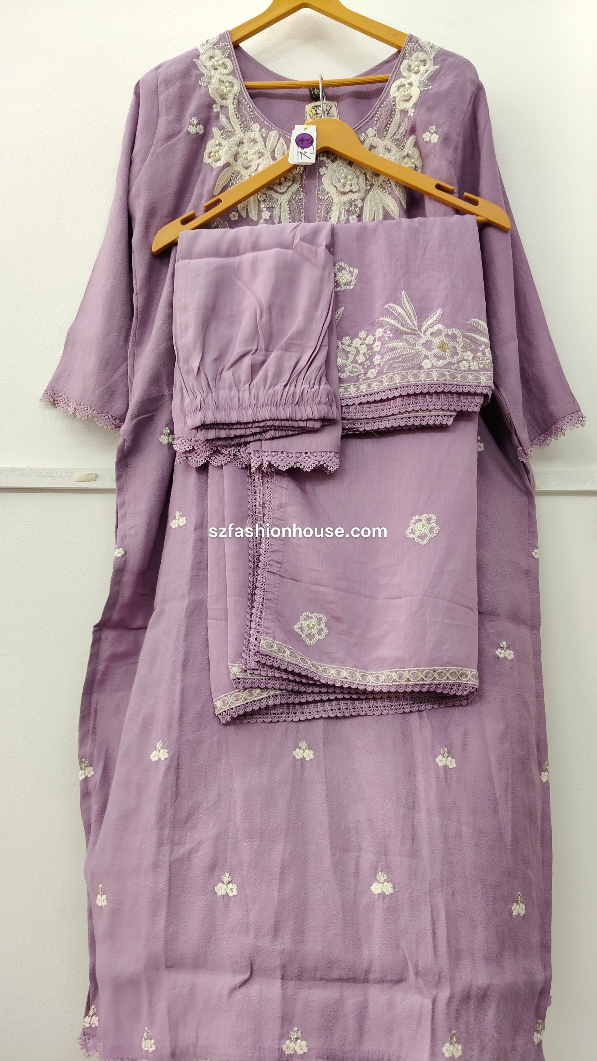 Purple embroidered outfit 