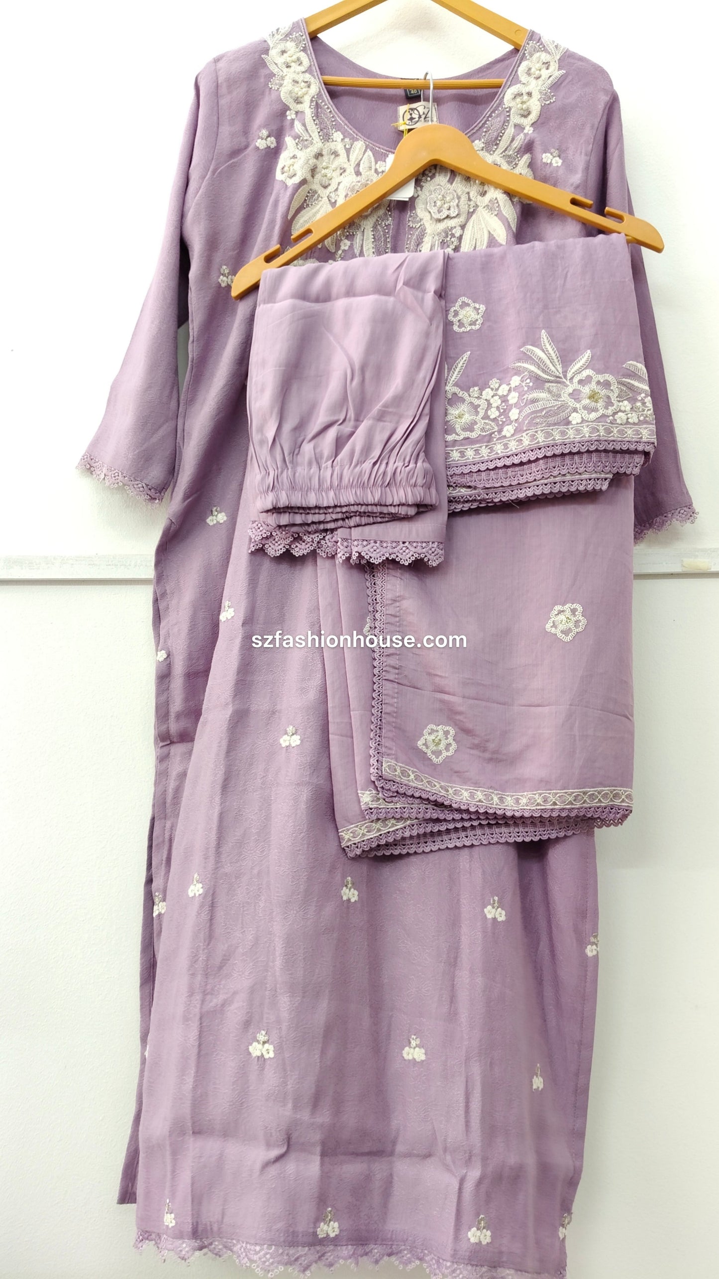 Purple traditional outfit with white embroidery 