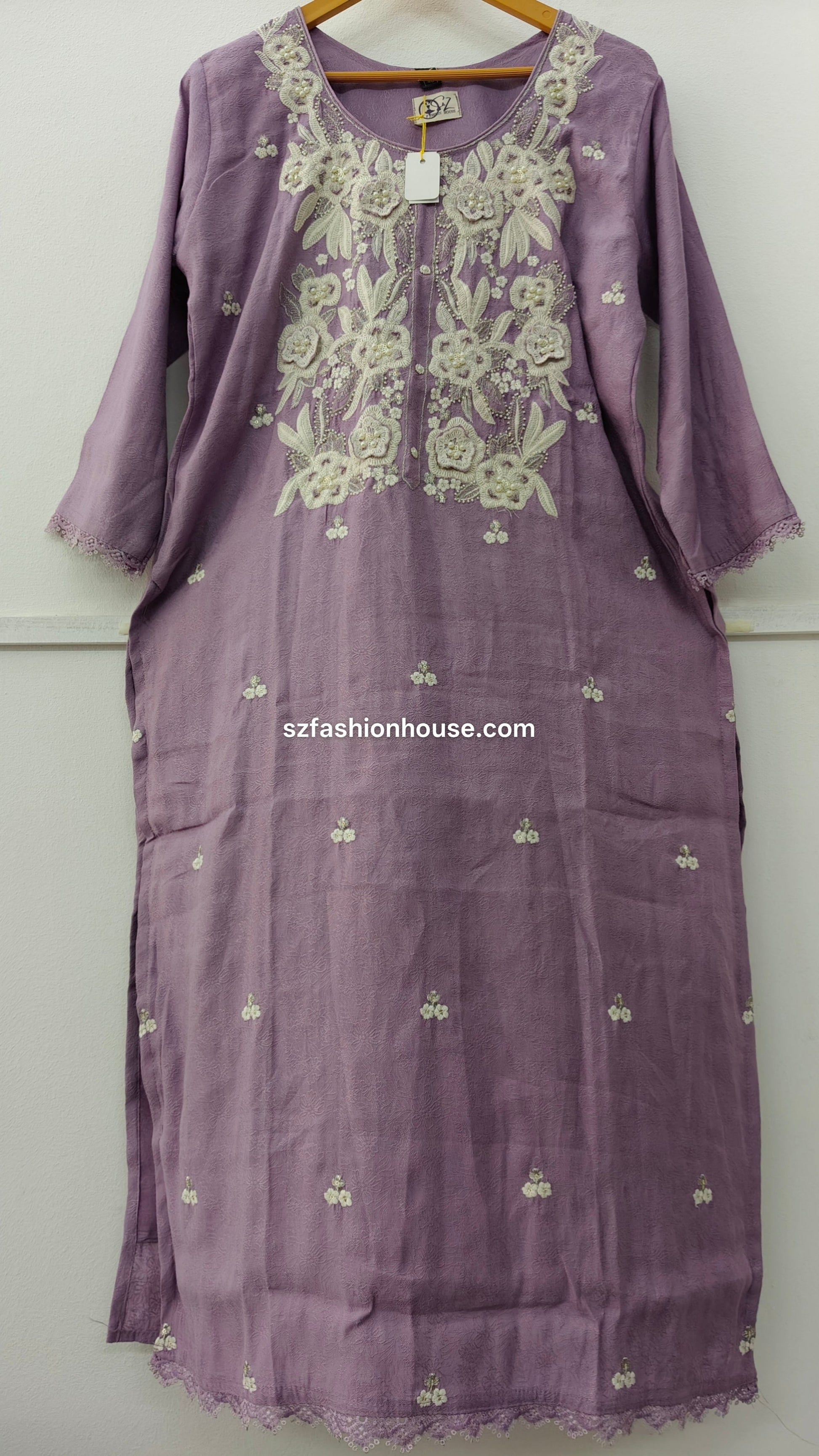 Purple dress with white floral embroidery