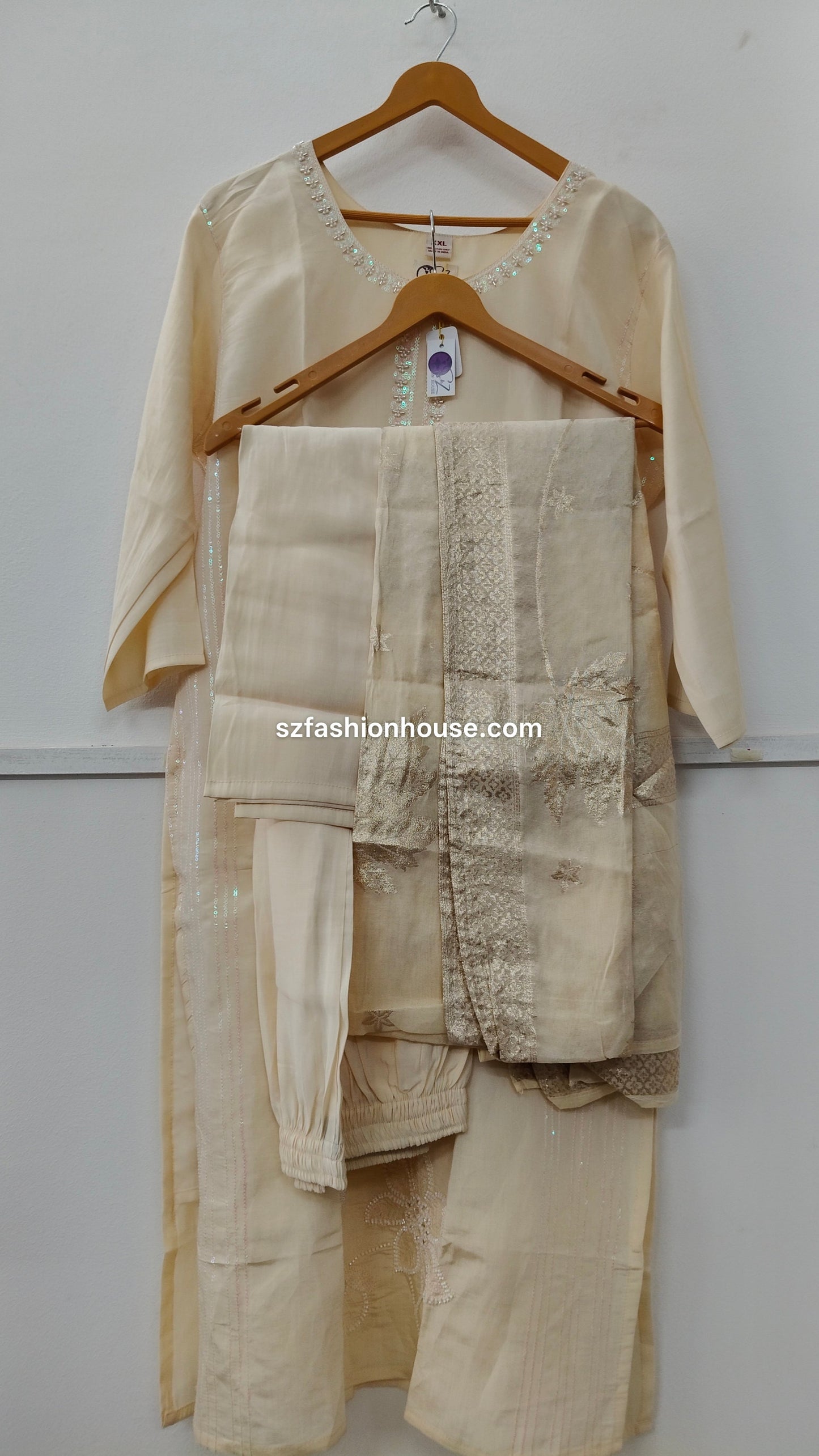 Beige traditional outfit with kurta, dupatta and pant